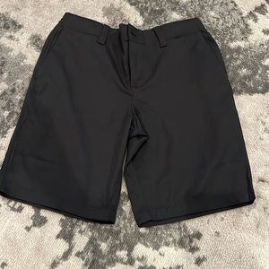 Boys size 10 black Under Armour adjustable button front shorts